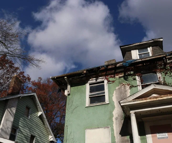 A vacant home in deteriorating condition sits in the suburbs of Newark, New Jersey. The home has become property of the city, along with the home right next door.